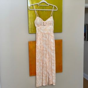 Light pastel peach and white jumper with side pockets!